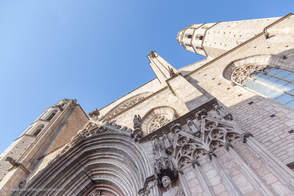 Doors of Santa Maria del Mar main entrance with stone porters or